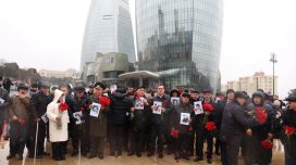 Vəhdət Partiyası 150 şəhidin şəkli ilə yürüşə çıxdı - FOTO