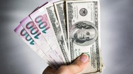 Dollar ucuzlaşır: Manata təsiri olacaq?