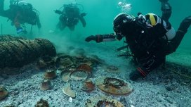 Arxeoloqlar gölün dibindən Roma imperiyasına aid 1000-dən çox xəzinə çıxardı