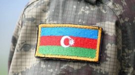 Prezident hərbi qulluqçuları və şəhid hərbçiləri təltif etdi
