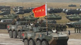 Çin pilotsuz uçuş aparatlarına qarşı qorunan zirehli transportyorunu nümayiş etdirdi