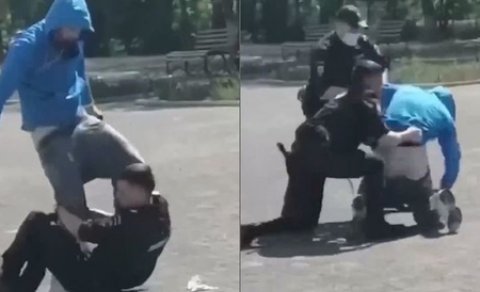 Rusiyada polis maskasız gənci döydü və... (VİDEO)