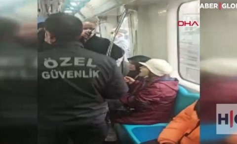 Maska taxmaqdan imtina edən qadınları qatardan zorla düşürdülər - VİDEO