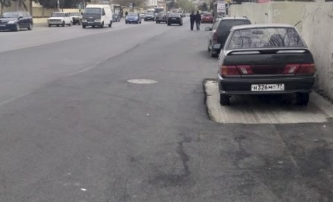 Maşını götürmədən yolu asfaltladılar - FOTO