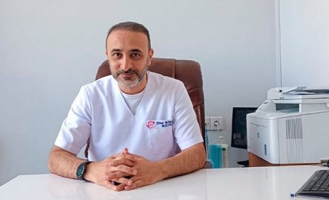 Maşınından və evindən silah tapılan həkim həbs edilib - İşini də itirib