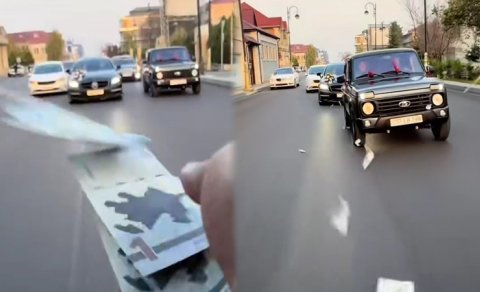 Toy karvanında "avtoş"luq edib yola pul səpdilər - VİDEO