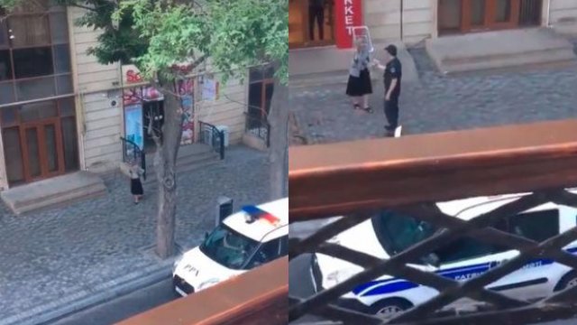 Bakıda polislər yeməklərini yaşlı qadına verdilər - VİDEO