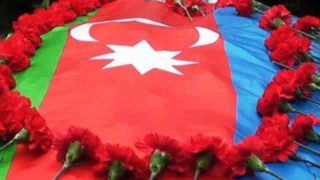 18 şəhidin məzarı II Şəhidlər Xiyabanına köçürülüb