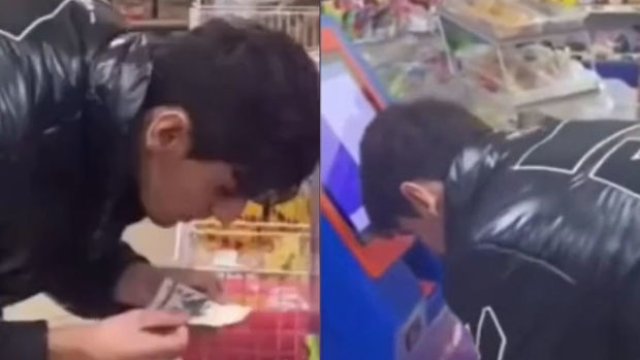 Əsginasın üzərinə tüpürərək ödəniş edən gənc polisə çağırıldı - VİDEO