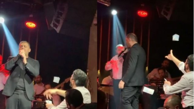 Azərbaycanlı müğənninin səhnədə başına pul səpdilər - Video