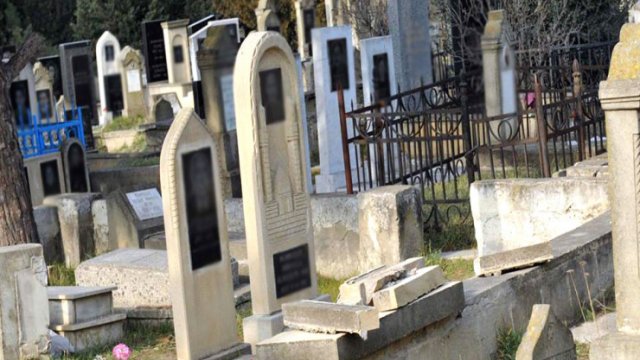Polis zabiti qəbiristanlıqda İNTİHAR ETDİ