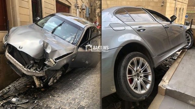 “Parkovşik” müştərinin BMW-sini qaçırmaq istəyərkən aşırdı - VİDEO