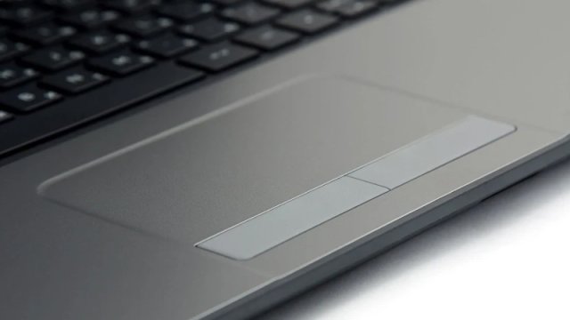Bəzi kompüterlərdə touchpad niyə mərkəzdə yerləşmir?